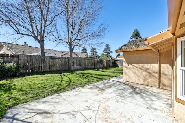 view of yard featuring a fenced backyard and a patio