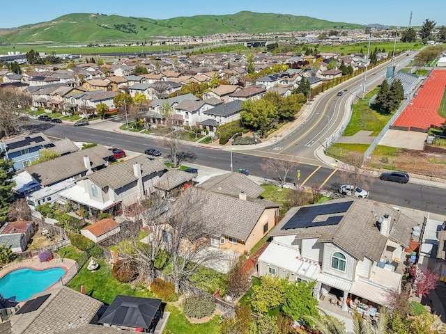 aerial view featuring a mountain view and a residential view