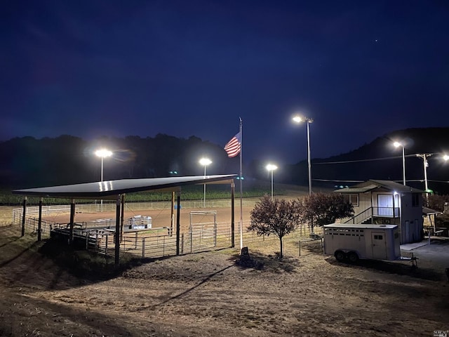 yard at twilight with an outbuilding
