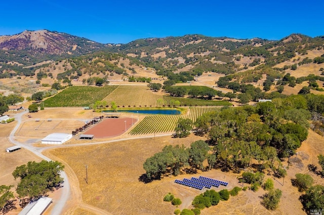 aerial view featuring a mountain view and a rural view