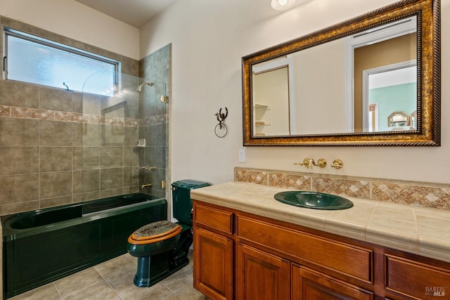 bathroom with tub / shower combination, vanity, toilet, and tile patterned flooring