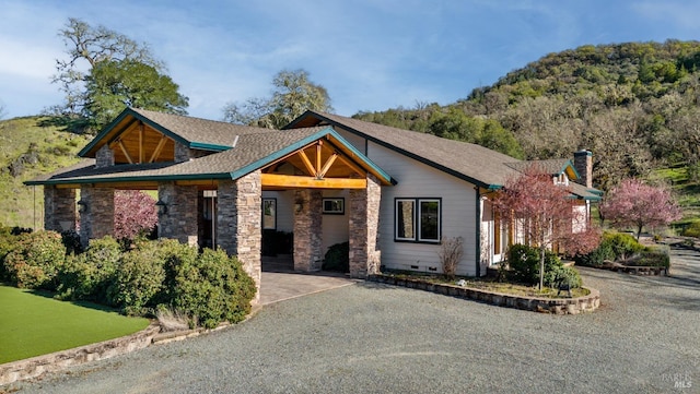 view of front facade featuring stone siding