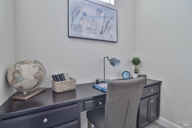 home office featuring built in study area