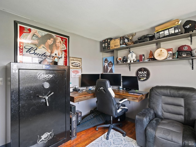 office space with wood finished floors