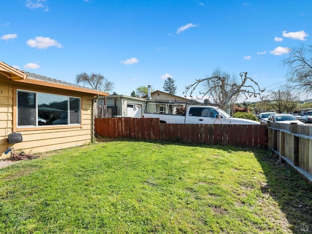 view of yard with fence