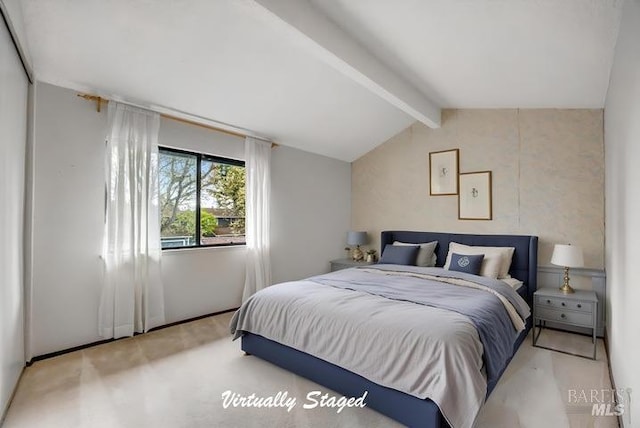 carpeted bedroom featuring vaulted ceiling with beams
