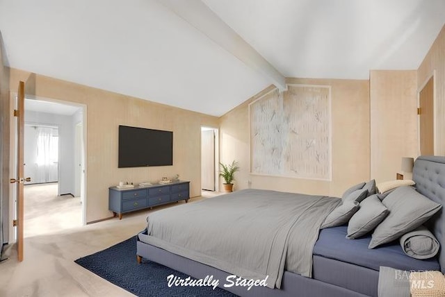 carpeted bedroom with lofted ceiling with beams