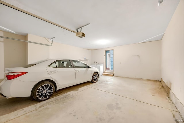 garage featuring a garage door opener