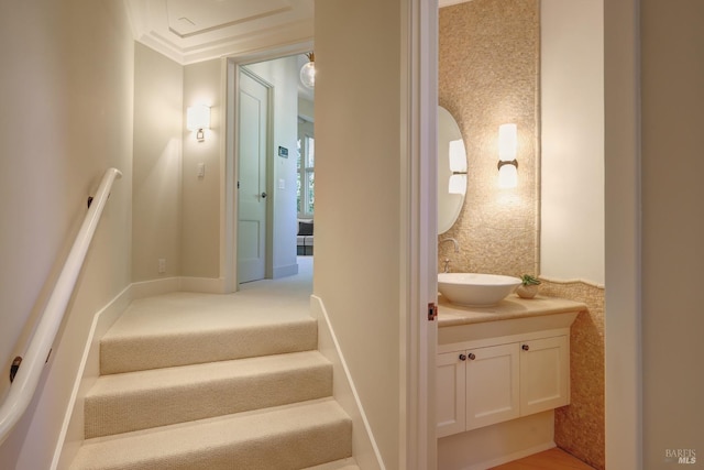 stairs with crown molding