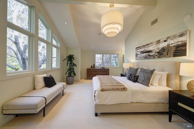 carpeted bedroom with high vaulted ceiling, visible vents, and beam ceiling