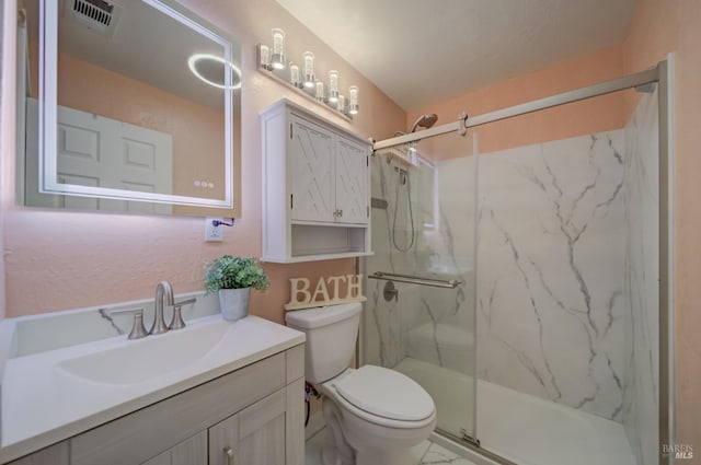 900 5th St, Fairfield, CA 94533 - full bath with a marble finish shower, vanity, and toilet