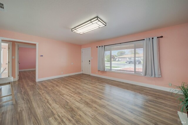 900 5th St, Fairfield, CA 94533 - spare room with baseboards and wood finished floors