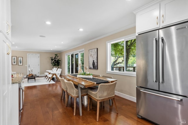 dining space featuring baseboards, recessed lighting, ornamental molding, and dark wood-style flooring