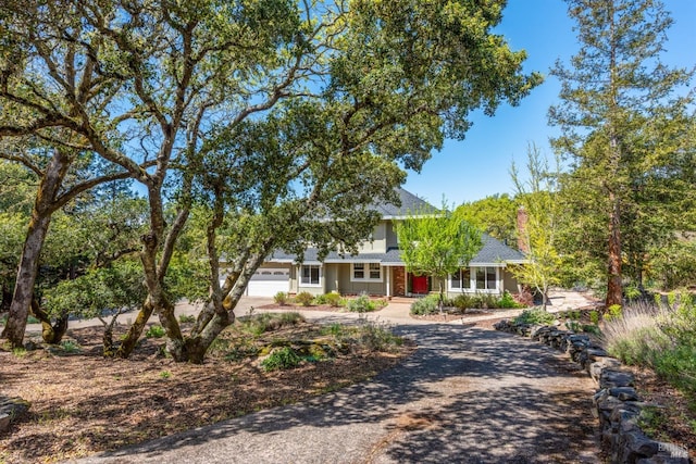 view of front of home featuring driveway and an attached garage