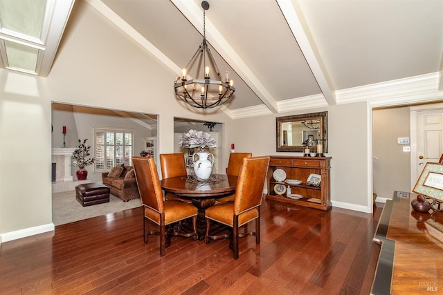 dining room with baseboards, beamed ceiling, a chandelier, and wood finished floors