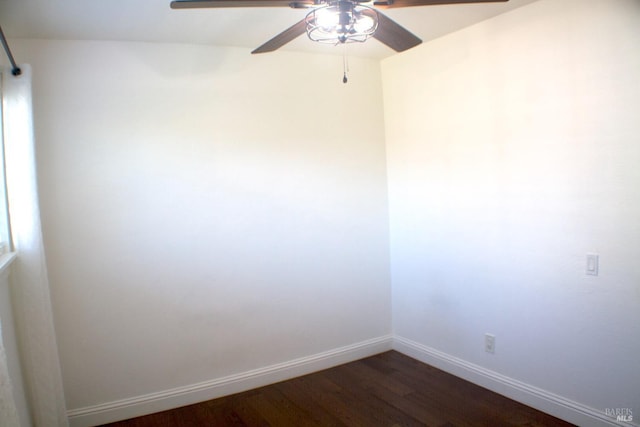 224 Walnut St, Suisun City, CA 94585 - empty room featuring dark wood-type flooring, baseboards, and a ceiling fan