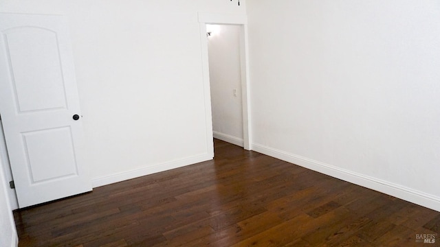 224 Walnut St, Suisun City, CA 94585 - unfurnished room featuring dark wood-style flooring and baseboards