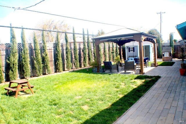 224 Walnut St, Suisun City, CA 94585 - view of yard with a fenced backyard, a gazebo, a patio area, and outdoor lounge area
