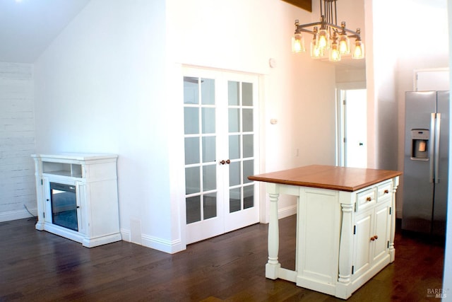 224 Walnut St, Suisun City, CA 94585 - kitchen featuring an inviting chandelier, white cabinetry, dark wood-style floors, wooden counters, and stainless steel fridge with ice dispenser