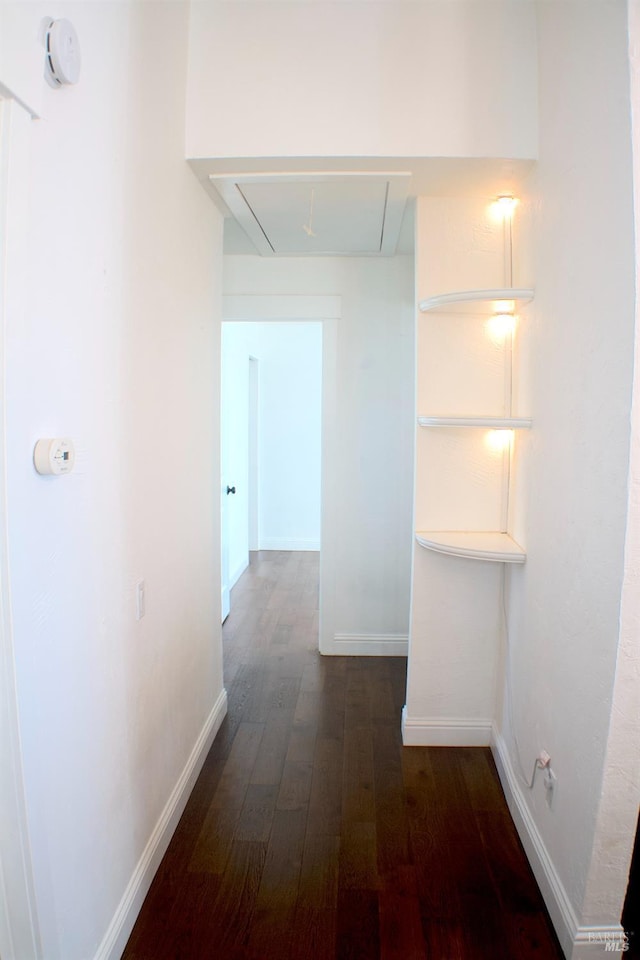 224 Walnut St, Suisun City, CA 94585 - corridor with baseboards, attic access, and dark wood-type flooring