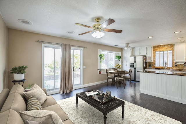 6705 Palmtree Ct, Fair Oaks, CA 95628 - living area with recessed lighting, a textured ceiling, dark wood-style flooring, and ceiling fan