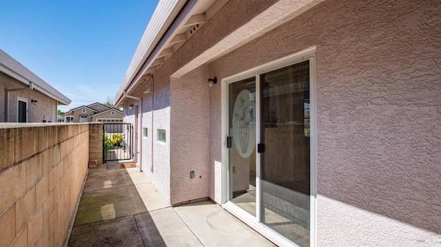 view of patio / terrace featuring fence