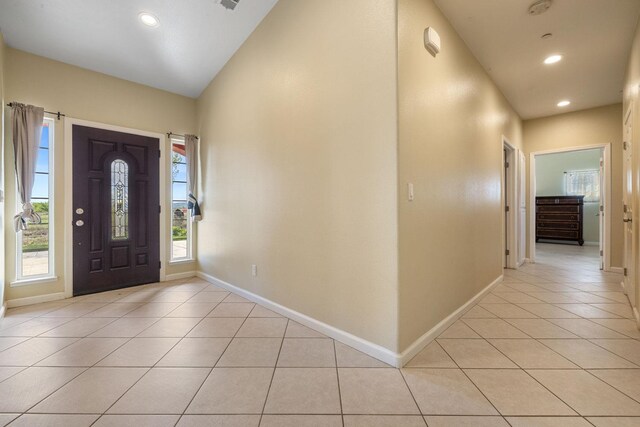 19810 S Spruce Rd, Los Banos, CA 93635 - entryway with light tile patterned floors, baseboards, and recessed lighting