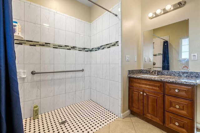 19810 S Spruce Rd, Los Banos, CA 93635 - full bath featuring a tile shower, vanity, and tile patterned flooring