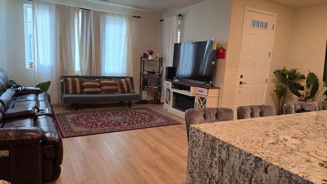 living area with light wood-style floors