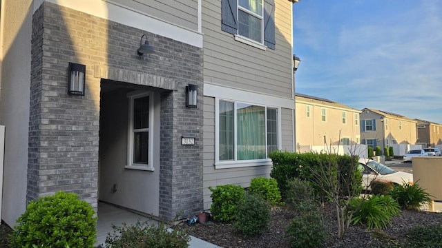 view of side of property with a residential view