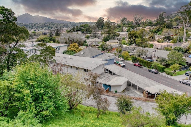 drone / aerial view featuring a mountain view