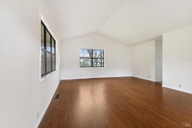 8401 Brandywine Dr, Ukiah, CA 95482 - unfurnished room with dark wood finished floors, visible vents, baseboards, and vaulted ceiling