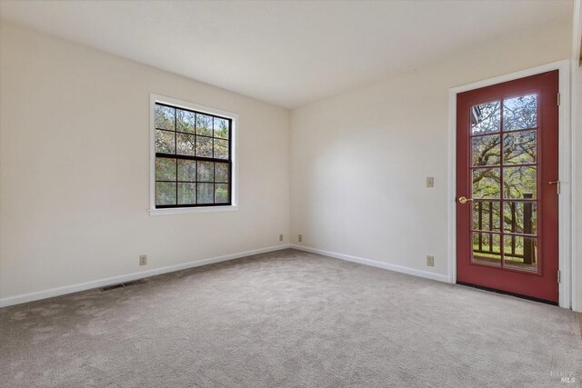 8401 Brandywine Dr, Ukiah, CA 95482 - carpeted spare room with visible vents and baseboards