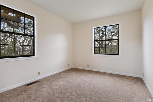 8401 Brandywine Dr, Ukiah, CA 95482 - carpeted spare room with a wealth of natural light, visible vents, and baseboards