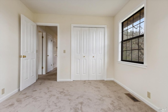 8401 Brandywine Dr, Ukiah, CA 95482 - unfurnished bedroom with baseboards, visible vents, carpet floors, and a closet