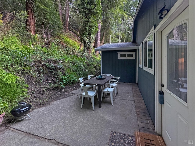 view of patio with outdoor dining area