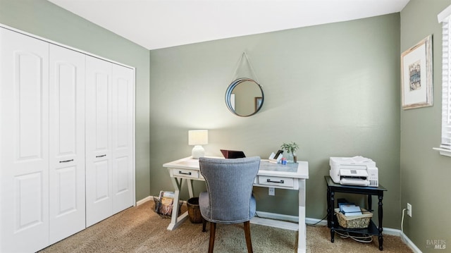 office with carpet flooring and baseboards