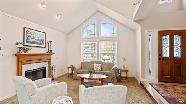 carpeted living area with visible vents, baseboards, lofted ceiling, and a premium fireplace