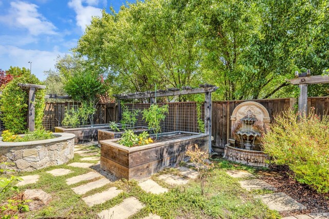 218 Saffron Ct, Napa, CA 94559 - view of yard featuring a vegetable garden and fence