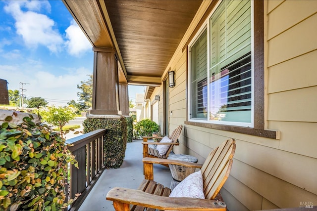balcony featuring a porch