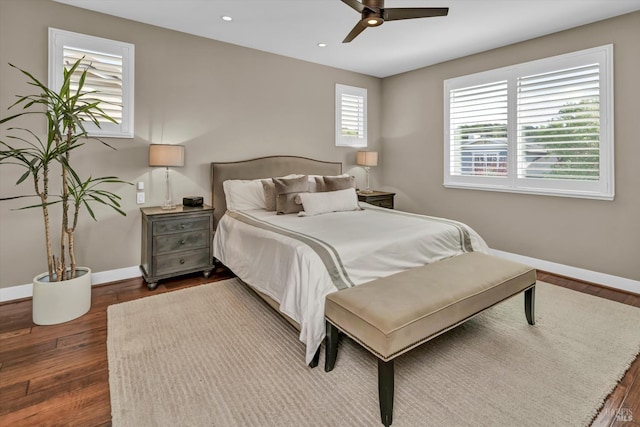 bedroom featuring baseboards, recessed lighting, a ceiling fan, and dark wood finished floors