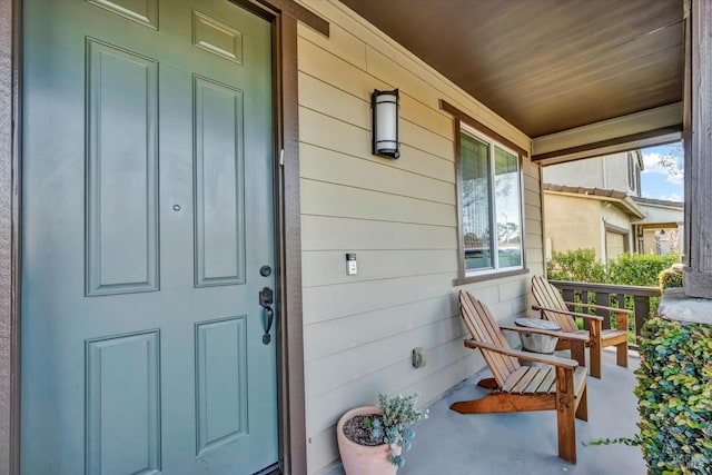 property entrance with covered porch