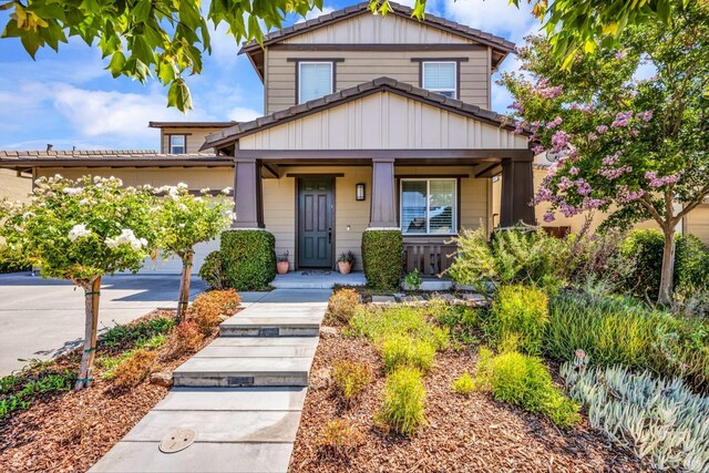 218 Saffron Ct, Napa, CA 94559 - view of front facade with a porch and board and batten siding