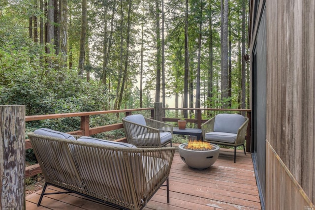 deck with a fire pit