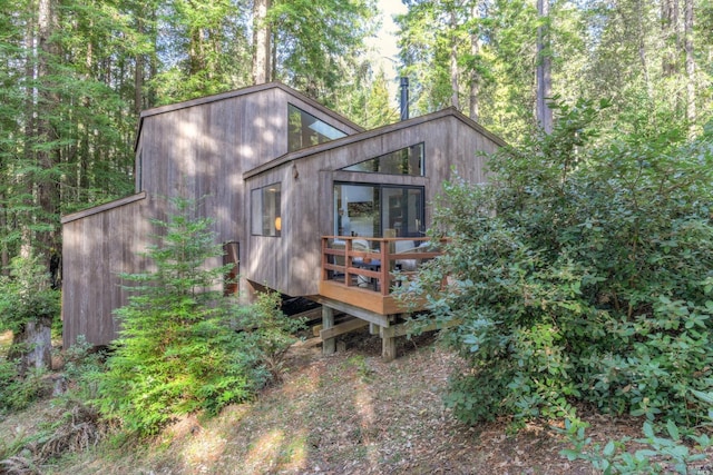 exterior space featuring a wooden deck