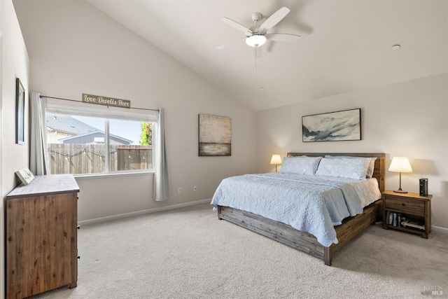 carpeted bedroom with baseboards, ceiling fan, and lofted ceiling