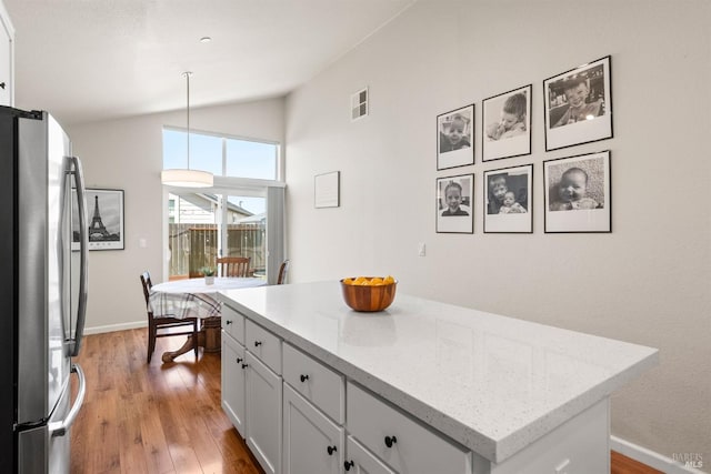 living room with recessed lighting, baseboards, light wood finished floors, and a fireplace