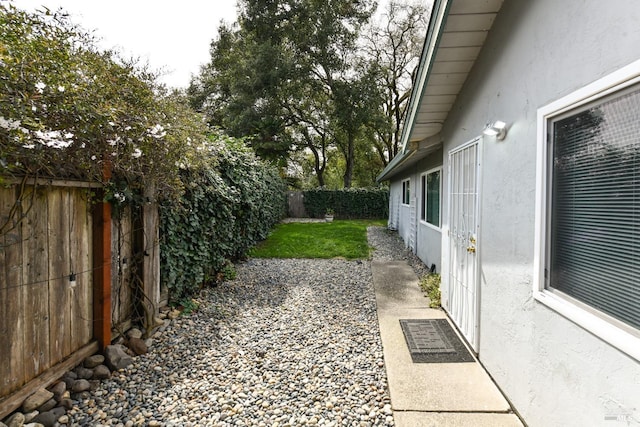 view of yard featuring a fenced backyard and a patio area