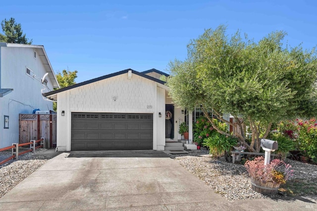view of front facade featuring a garage and concrete driveway