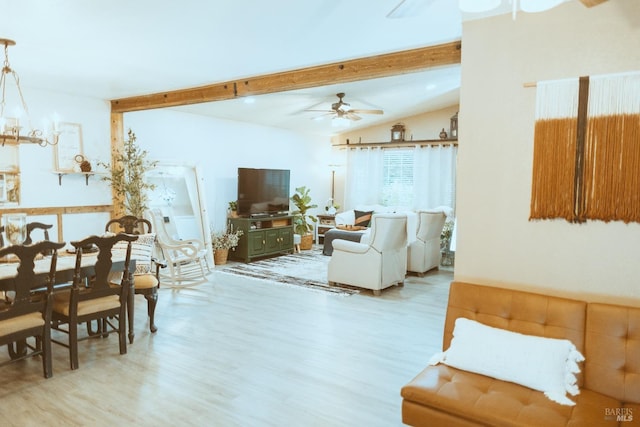 living area featuring wood finished floors and a ceiling fan